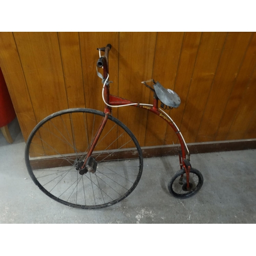 617 - A Vintage Child Size Penny Farthing Bike