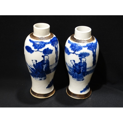 86 - A Pair Of Chinese Blue & White Baluster Vases Each Decorated With Figures In Garden Settings, Seal M... 