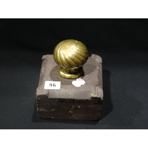 96 - An Antique Welsh Slate Door Stop With Brass Finial