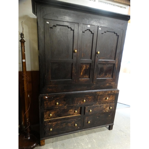 694 - An Antique Oak Press Cupboard With Four Drawers To The Base