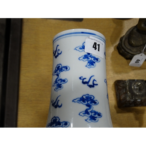 41 - A Circular Based Chinese Blue & White Narrow Necked Vase, The Body Decorated With Dragons Amongst Cl... 