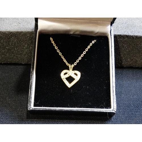 273 - An 18ct Gold & Diamond Set Heart Shaped Pendant On A Fine Link Chain