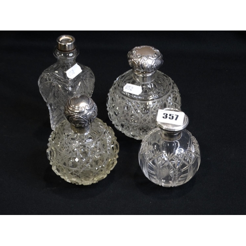 357 - Four Silver Topped Glass Perfume Bottles