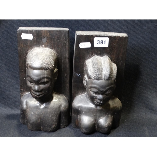 391 - A Pair Of Carved African Hardwood Bookends