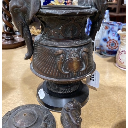 112 - A Circular Based Moulded Urn With Twin Elephant Head Handles, 8