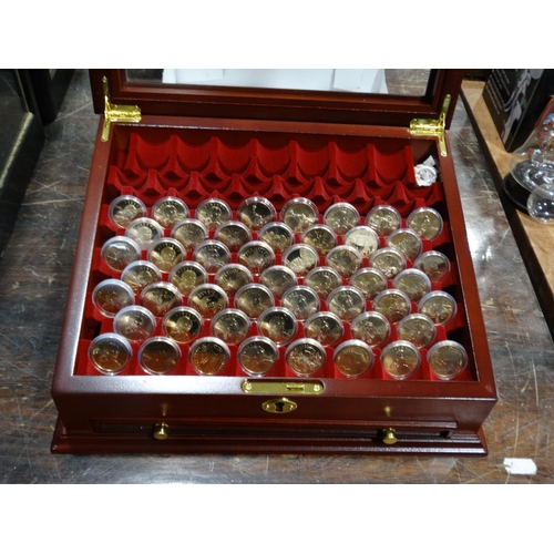A Collectors Coin Case & Coins