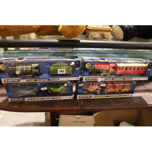Four Boxed Car & Train Sets