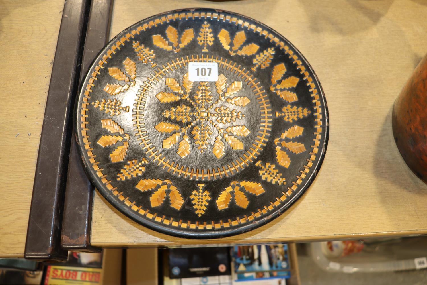 A CIRCULAR RUSSIAN STRAW WORK PLATE