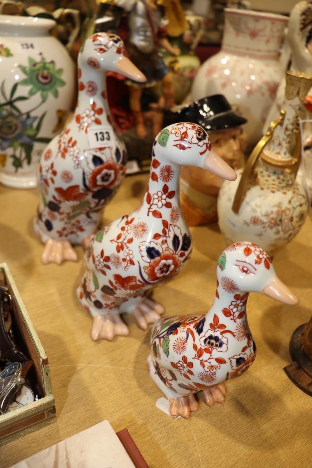 A SET OF THREE GRADUATED DUCK ORNAMENTS