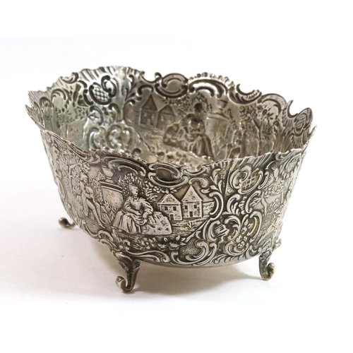 267 - A 19TH CENTURY DUTCH SILVER BOWL
Embossed with a Rococo landscape, bearing a fleur de lis mark to ba... 