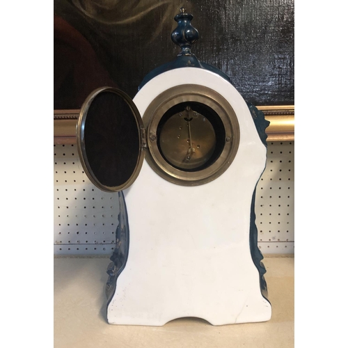 275 - A LATE 19TH CENTURY FRENCH CHINA CASED MANTLE CLOCK
With gilt and enamelled dial above a decorated p... 