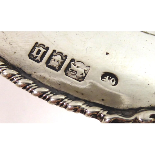 270 - JOSIAH WILLIAMS & CO., AN EARLY 20TH CENTURY SILVER CAKE BASKET
Having a gadrooned edge broken up by... 