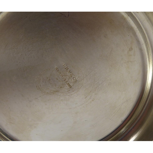 271 - PHV & CO., A 20TH CENTURY WHITE METAL PITCHER
The tapering form body having a boars tusk handle, sta... 