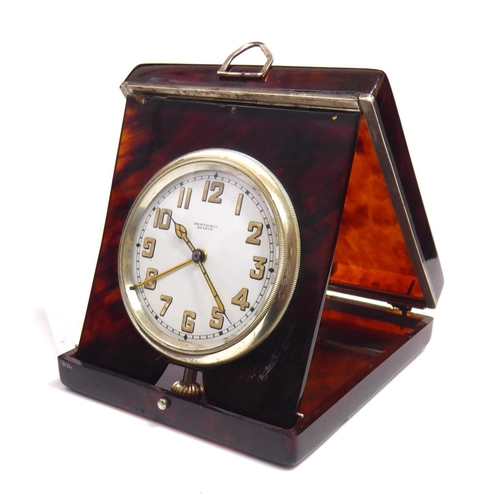 241 - AN EARLY 20TH CENTURY BERTHOUD GENEVE TORTOISE SHELL TRAVELLING ALARM CLOCK With a folding case and ... 