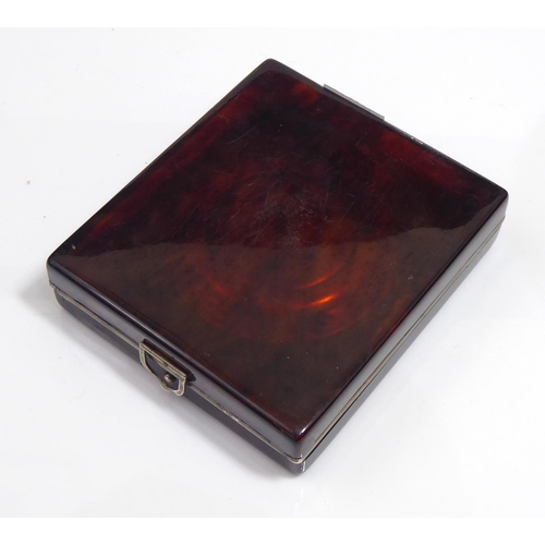 241 - AN EARLY 20TH CENTURY BERTHOUD GENEVE TORTOISE SHELL TRAVELLING ALARM CLOCK With a folding case and ... 