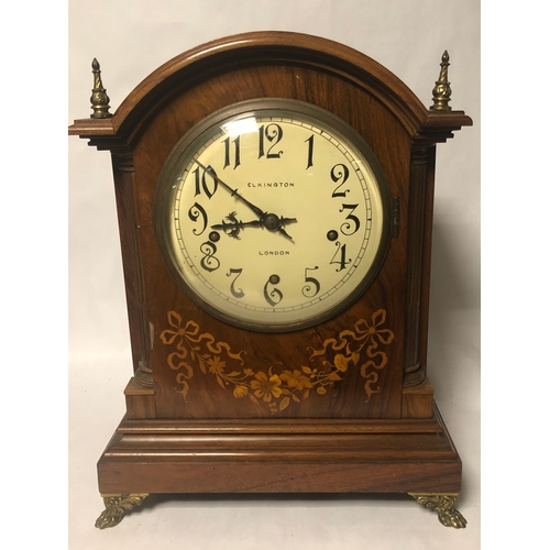 277 - ELKINGTON, LONDON, A LARGE 19TH CENTURY WALNUT AND FLORAL MARQUETRY INLAID MANTLE CLOCK
The circular... 