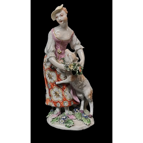 358 - DERBY, A PORCELAIN FIGURE OF A SHEPHERDESS, CIRCA 1765
Placing a garland around the neck of a rearin... 