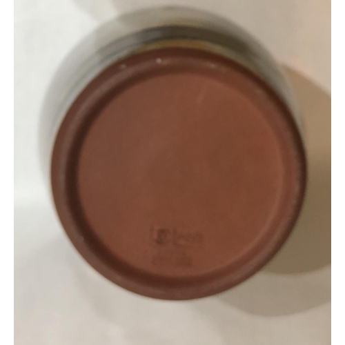 381 - POOLE POTTERY, A LARGE EARTHERNWARE BALUSTER SHAPED VASE 
From the Atlantis rouge, designed by Guy S... 