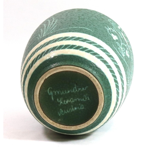 383 - GMUNDER KERAMIK, AUSTRIAN, AN ART DECO SHOULDERED VASE
Sgrafitto decorated with leaping gazelles ami... 