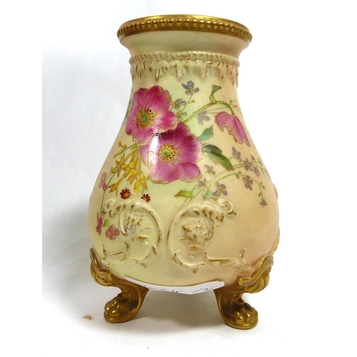 375 - ROYAL DOULTON, A FLAMBÉ PORCELAIN BOTTLE VASE
The red ground decorated in woodcut pattern (pattern n... 