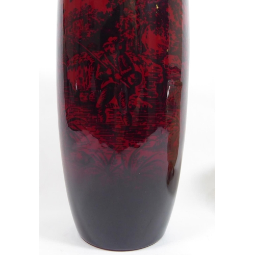 375 - ROYAL DOULTON, A FLAMBÉ PORCELAIN BOTTLE VASE
The red ground decorated in woodcut pattern (pattern n... 