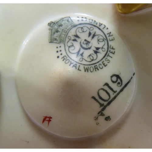 375 - ROYAL DOULTON, A FLAMBÉ PORCELAIN BOTTLE VASE
The red ground decorated in woodcut pattern (pattern n... 