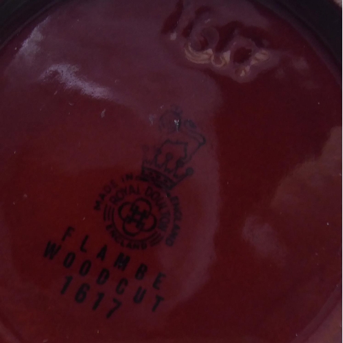 375 - ROYAL DOULTON, A FLAMBÉ PORCELAIN BOTTLE VASE
The red ground decorated in woodcut pattern (pattern n... 