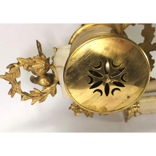 281 - Having a bird form finial, barrel movement and column supports, dial marked 'A La Renaisence, 49 Bd ... 