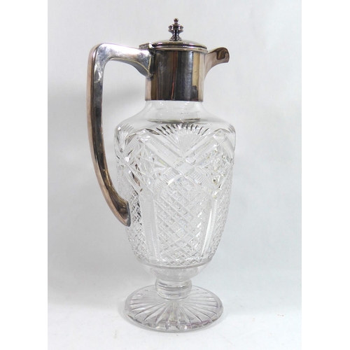 257 - AN EARLY 20TH CENTURY SILVER PLATED CLARET JUG
Shouldered form with cut glass decoration.  
(h 29cm)