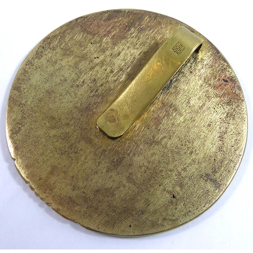 430 - A GILT METAL MEDALLION
Decorated with the Mayan calendar.  
(d 5.5cm)