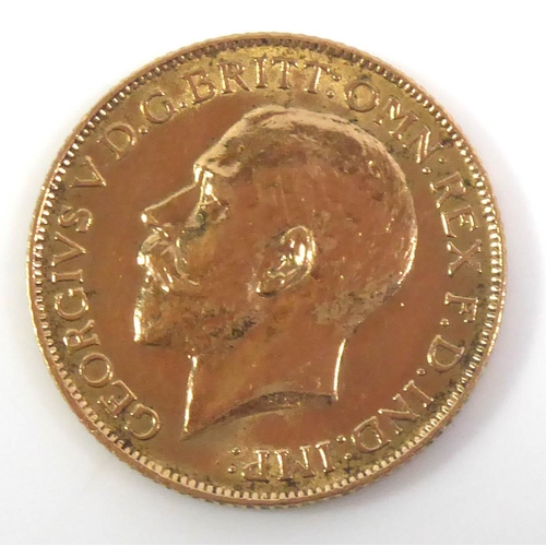 1 - AN EARLY 20TH CENTURY 22CT GOLD FULL SOVEREIGN COIN, DATED 1912
Bearing portrait of King George V an... 