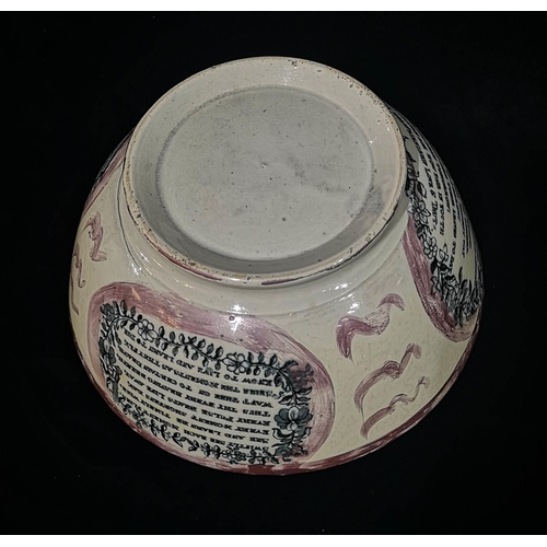103 - AN EARLY 19TH CENTURY SUNDERLAND LUSTRE POTTERY BOWL
Black transfer decoration of a view of the Iron... 