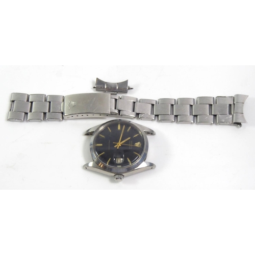 29 - ROLEX, OYSTERDATE, A VINTAGE PRECISION GENT’S STAINLESS STEEL WRISTWATCH
The black circular dial wit... 