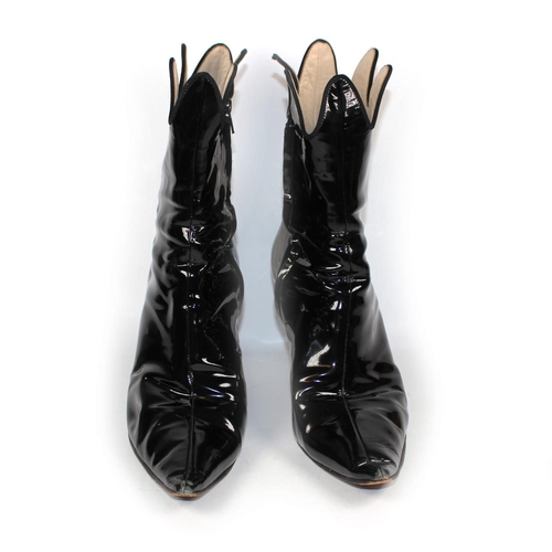 189 - VIVENNE WESTWOOD, BLACK PATENT ANKLE BOOTS 
With side zip, scalloped edge and pointed toe (size 39).... 