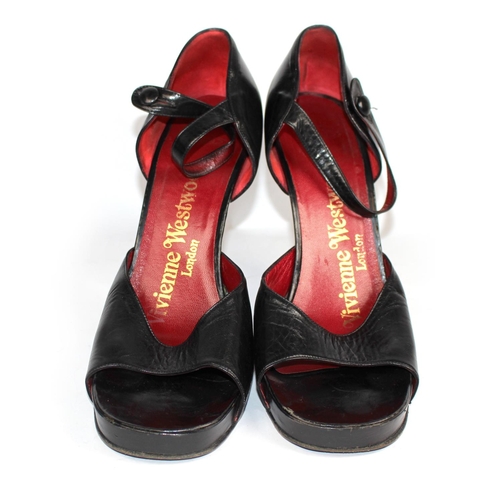 194 - VIVIENNE WESTWOOD, BLACK LEATHER OPEN TOE HEELS
Brown naturalistic heel (size 38). 
(heel 10.5cm)