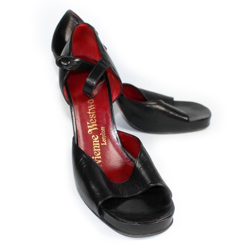 194 - VIVIENNE WESTWOOD, BLACK LEATHER OPEN TOE HEELS
Brown naturalistic heel (size 38). 
(heel 10.5cm)