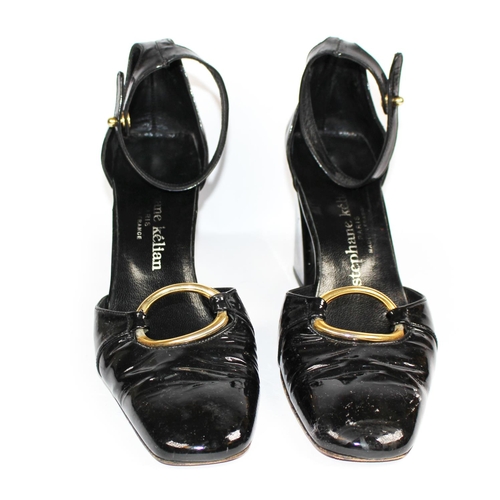 199 - STEPHANE KÉLIAN, BLACK PATENT LEATHER SANDALS
With a gold central buckle, ankle strap, wedged heel (... 