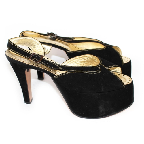 200 - BALENCIAGA, A PAIR OF BLACK LEATHER HEELS
Open toe and strap design, Size 39, sold together with a p... 