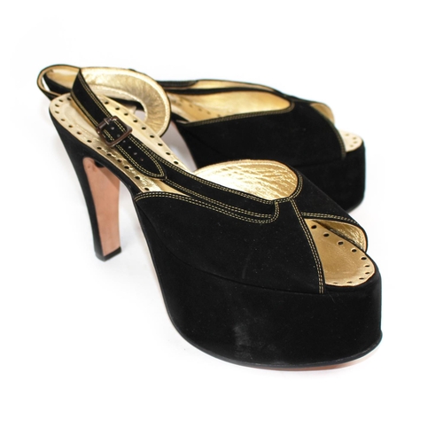 200 - BALENCIAGA, A PAIR OF BLACK LEATHER HEELS
Open toe and strap design, Size 39, sold together with a p... 