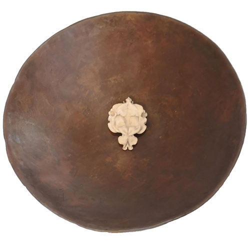 146 - YASSI MAZANDI, A BRONZE AND CERAMIC WALL HANGING SCULPTURE
Titled ‘Orchid’, the circular bronze bowl... 