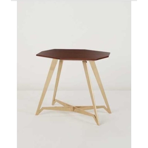 150 - GIO PONTI, 1891 - 1979, A WALNUT SIDE TABLE
The octagonal top raised on tapering brass legs, joined ... 