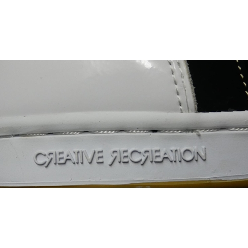 170 - CREATIVE RECREATION, A PAIR OF BLACK AND WHITE LEATHER TRAINERS
(size 7).

Condition: A+