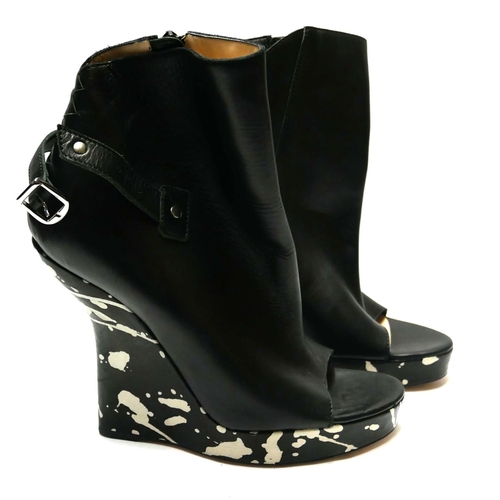 174 - JEAN-PAUL GAULTIER, A PAR OF BLACK AND WHITE LEATHER OPEN TOE WEDGE ANKLE BOOTS
(size 39).

Conditio... 