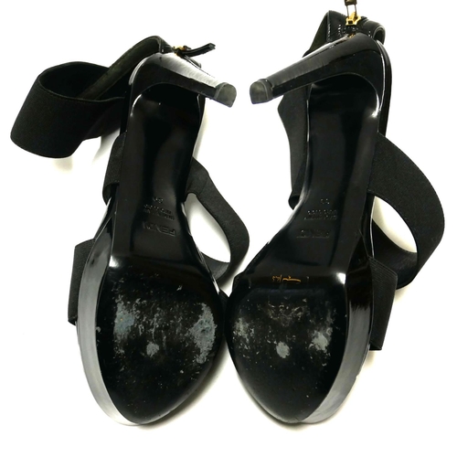 180 - FENDI, A PAIR OF BLACK LEATHER AND CANVAS OPEN TOE STRAP HEELS
(size 39).

Condition: A