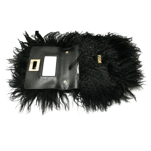 421 - MICHEL KLEIN, A MONGOLIAN FUR HANDBAG
With internal mirror and gilded.

Condition: A