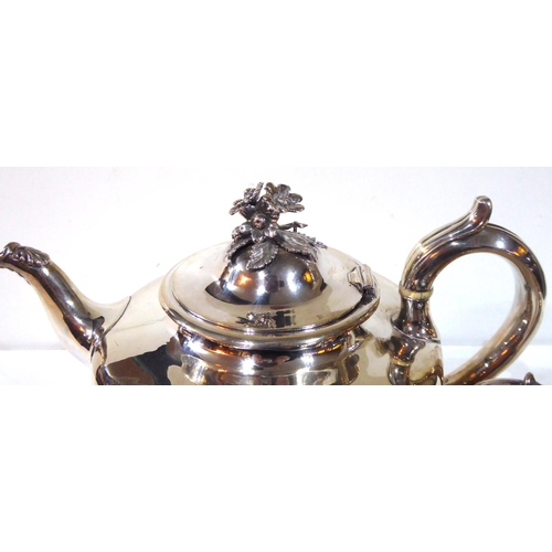 413 - A VICTORIAN SILVER THREE PIECE TEA SERVICE
Comprising a large teapot with floral finial, sugar basin... 