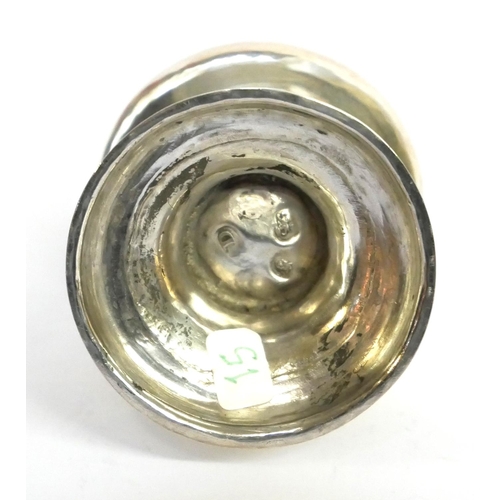 426 - A GEORGIAN SILVER BUN TOP BALUSTER CASTER
Having a pierced lid, hallmarked London, TD.
(approx 12cm)... 