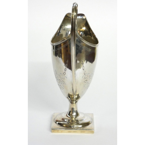 428 - A GEORGIAN SILVER CLASSICAL HELMET FORM CREAM JUG
With gilt interior, hallmarked John Merry, London,... 