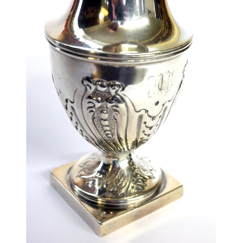 432 - A GEORGIAN SILVER CLASSICAL HELMET FORM CREAM JUG
With embossed fluted decoration, hallmarked London... 