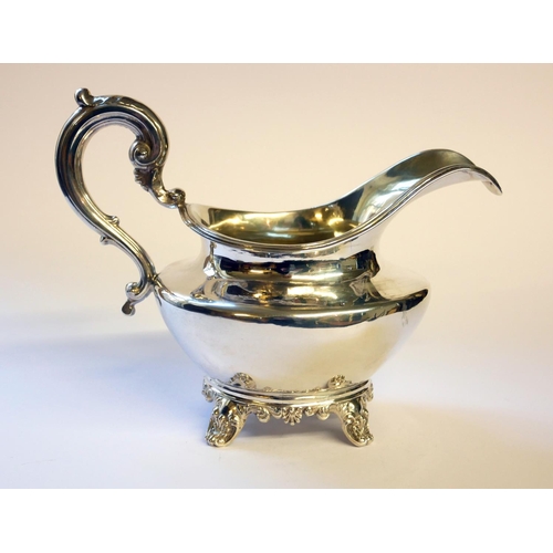 435 - A WILLIAM IV SILVER CREAM JUG
Having a scrolled handle and gilt interior, hallmarked Hoseph and Albe... 